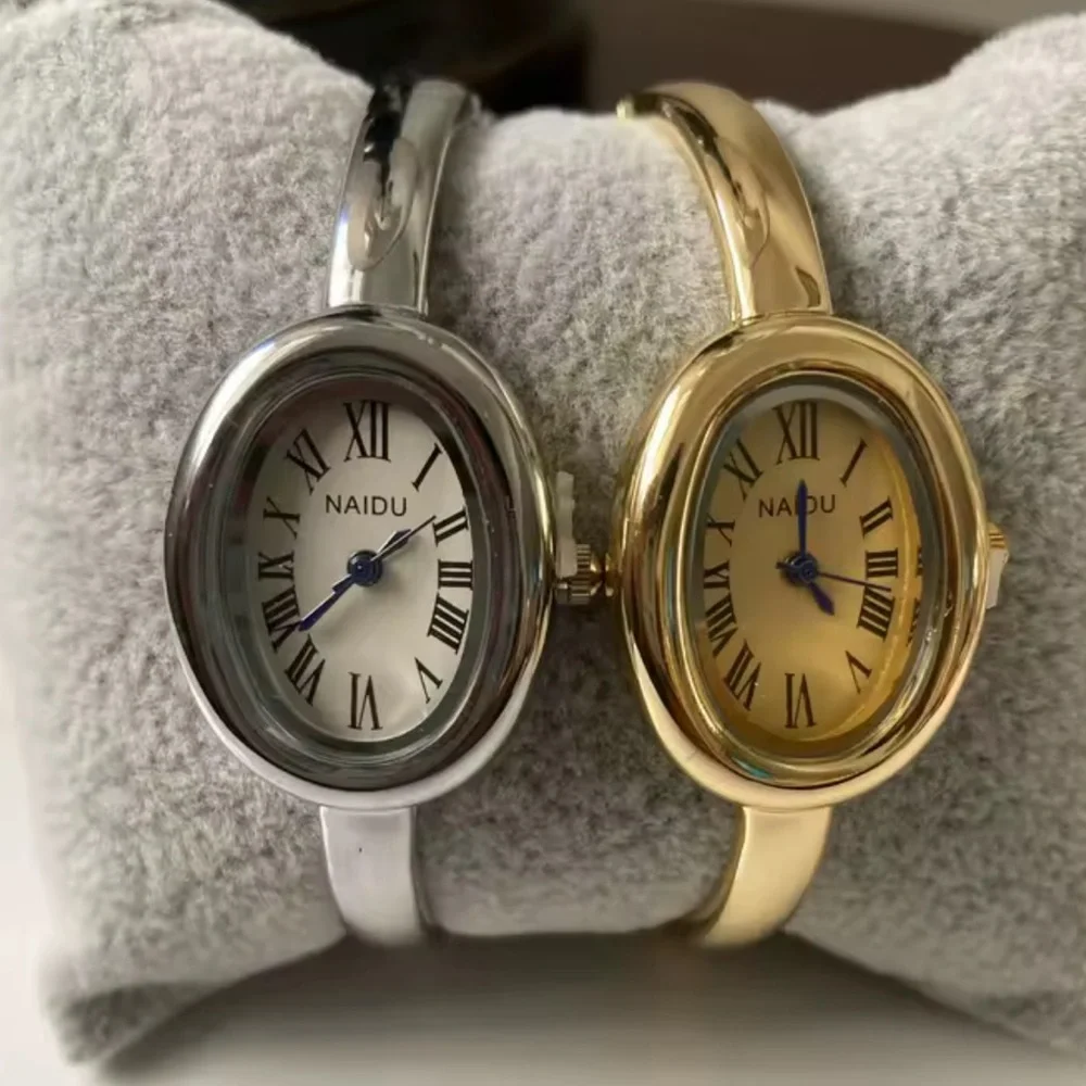 Anthropologie Gold Oval Bangle Watch with White Dial